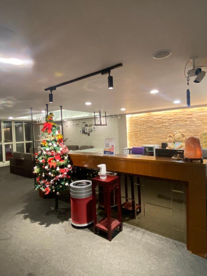 Aiyue Hotel Huwei Экстерьер фото